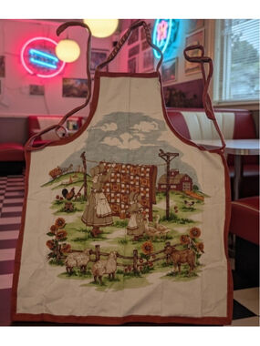 vintage apron is made from a "Concord French Country" cotton fabric panel design